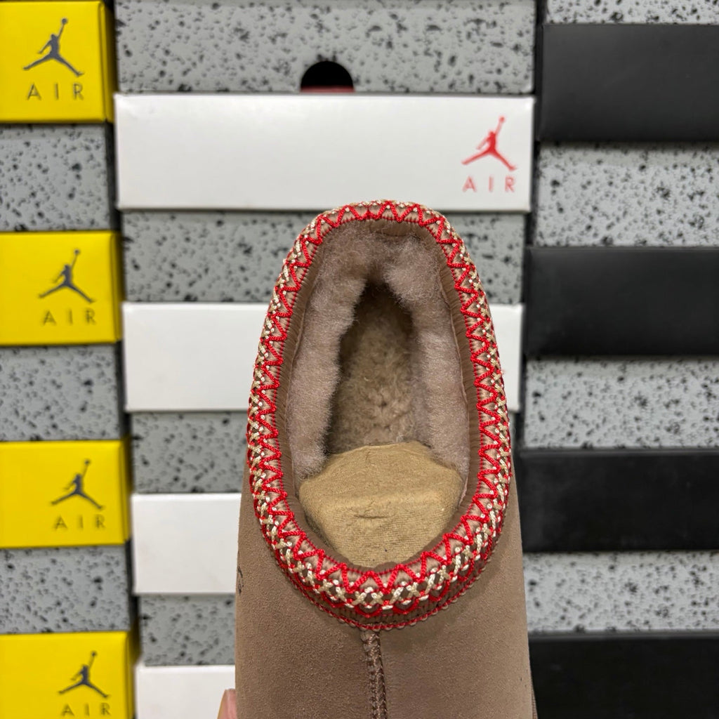 UGG Tasman Slip-On Slipper – Suede Moccasin with Shearling Lining, Red & Gold Woven Collar & Mocha Lug Sole in Camel